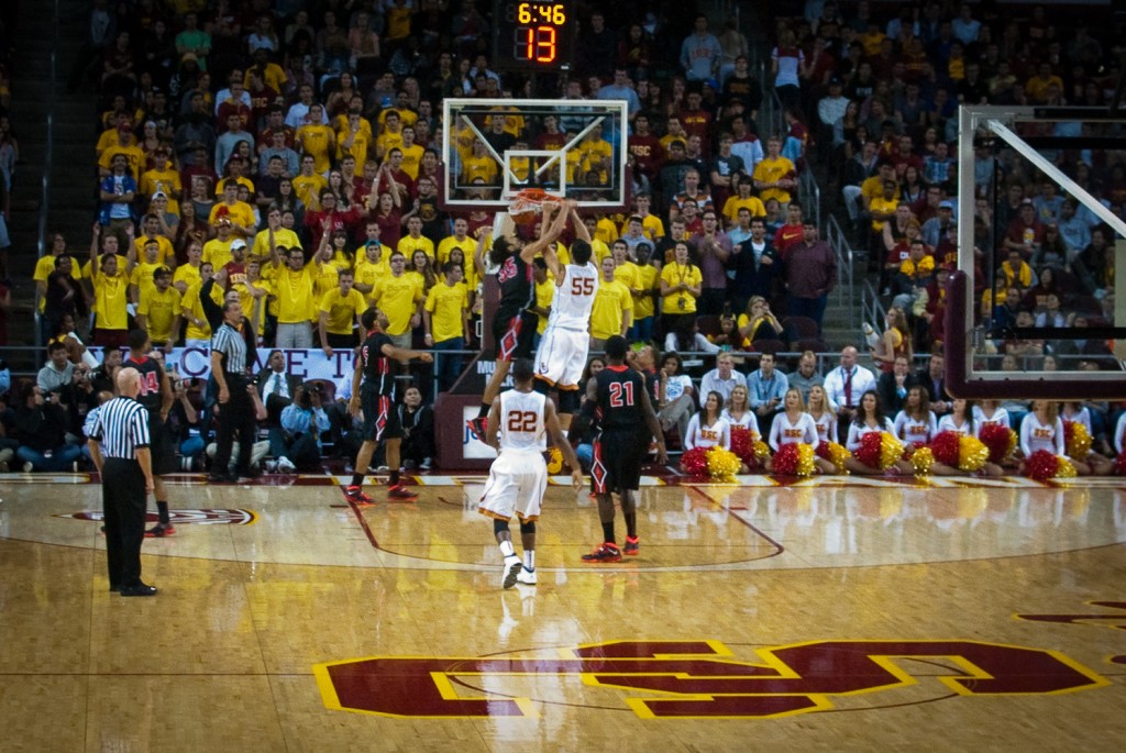 12-NOV-2013: Solid image of an Omar Oraby dunk at USC hoops' season opener.