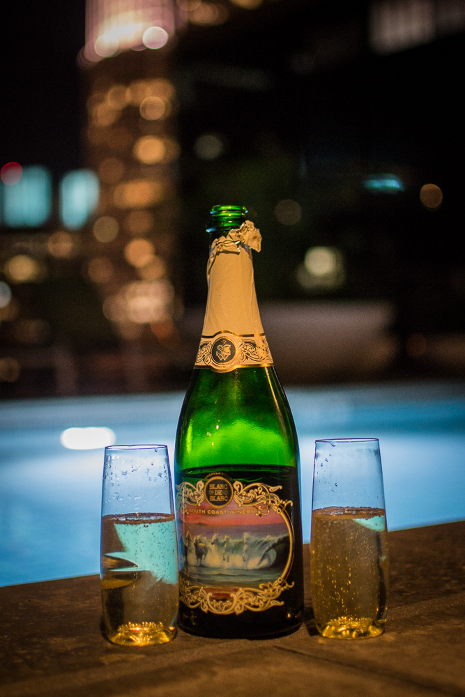 30-DEC-2013: Our first chance to celebrate the engagement at home. Perfect weather for some champagne on the roof!