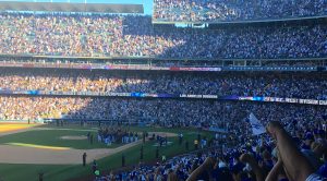 The NL West champion Dodgers doff their caps to Vin Scully on Sept. 25, 2016.