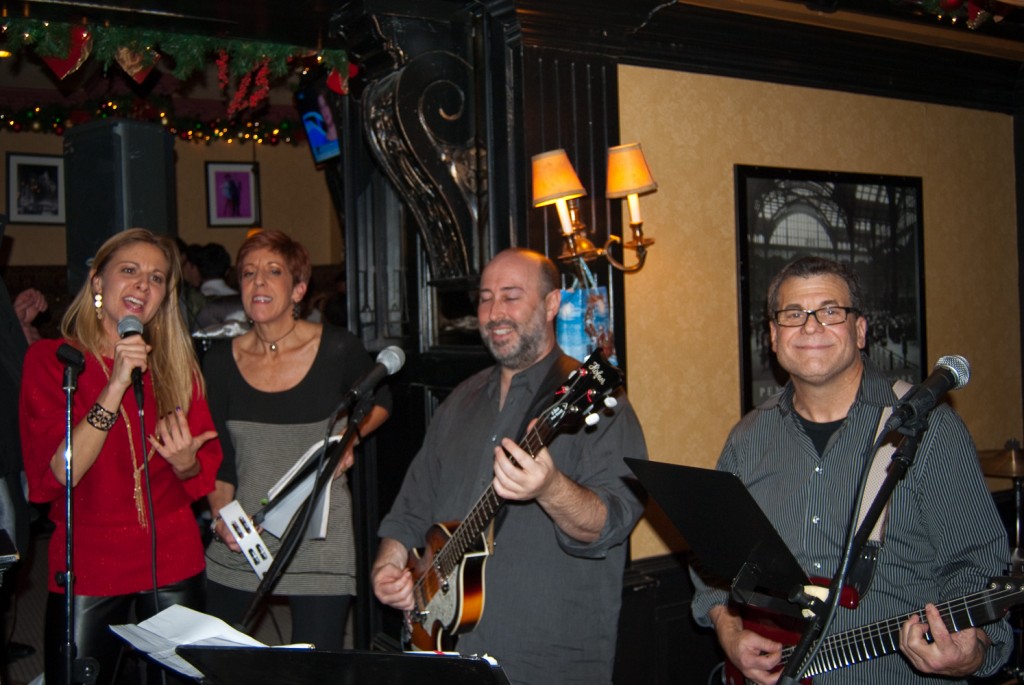 10-DEC-2013: Some great industry folks rocking out onstage at an afterparty following our annual NYC Winter Bash.